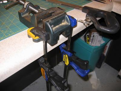 Cutting weights in vise